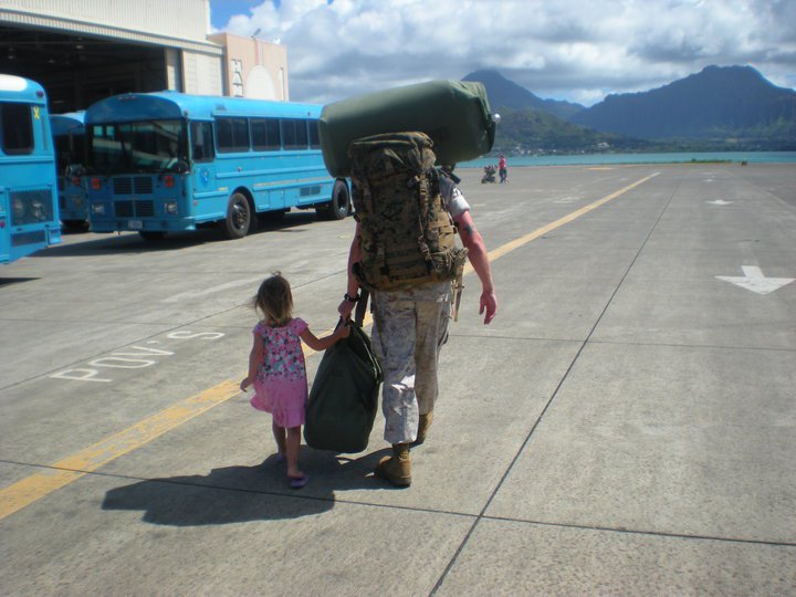 Marine and his daughter