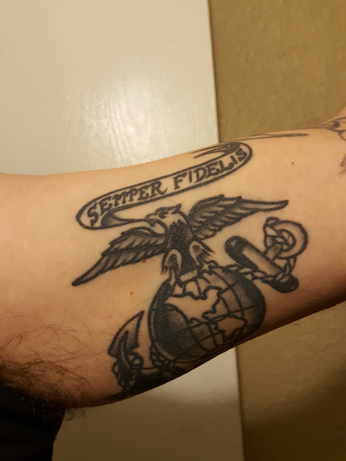 Eagle, Globe, and Anchor Tattoo